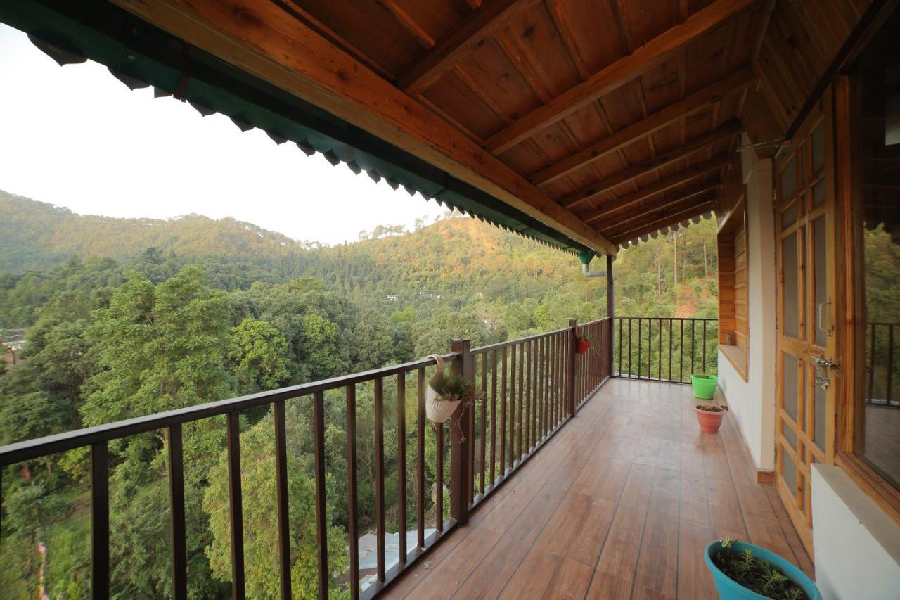 The Wooden Umbrella Near Kaichi Dhaam Homestay Bhimtal