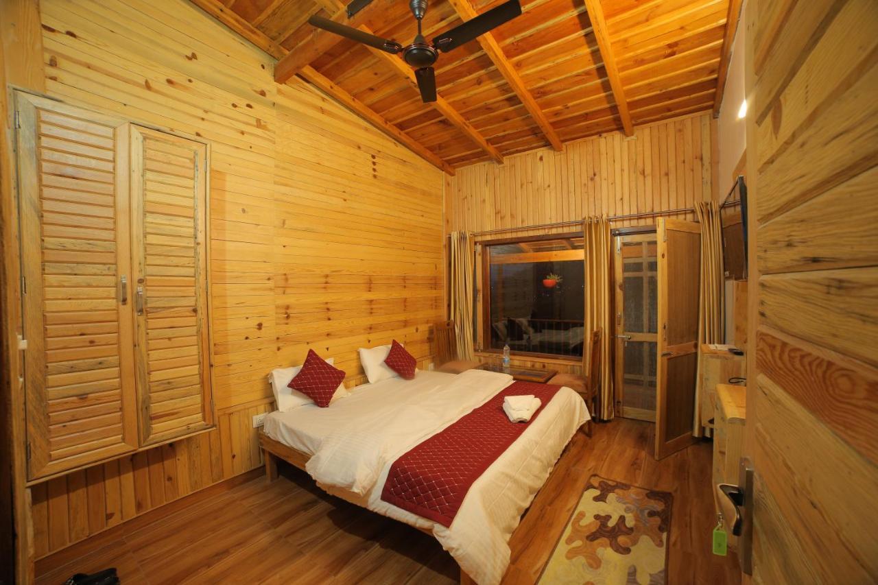 The Wooden Umbrella Near Kaichi Dhaam Homestay Bhimtal